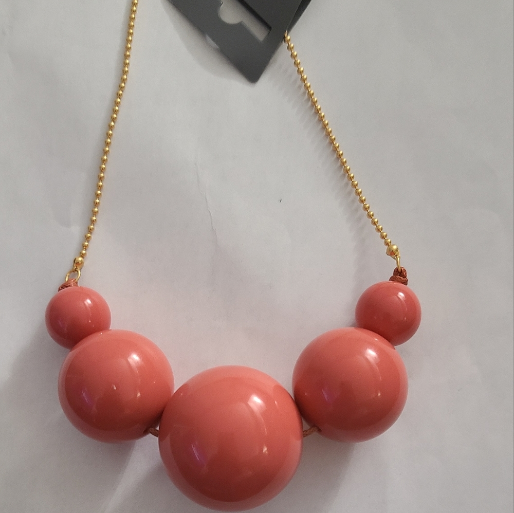 Coral Pilgrim large ball necklace, NWT.